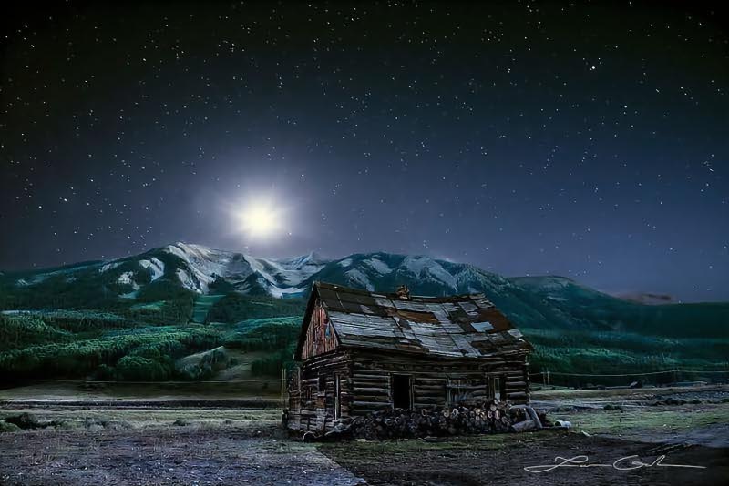An old barn with mountains around and stars and moonlight - Small