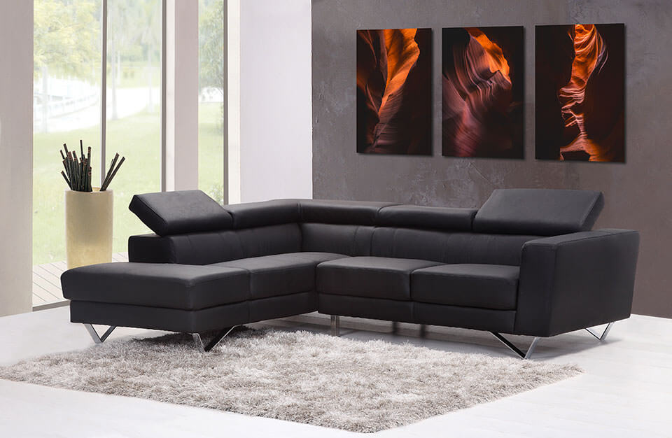 Interior design with Gintchin Fine Art triptych of abstract photo art above a black sofa modern interior