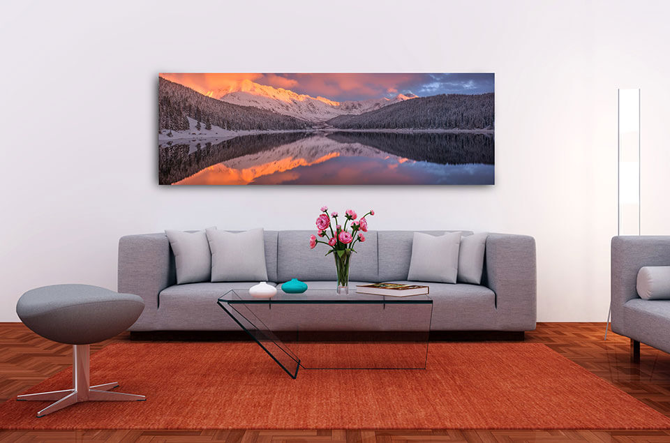 Interior design with Gintchin Fine Art panoramic print of a mountain lake sunset reflection a contemporary sofa