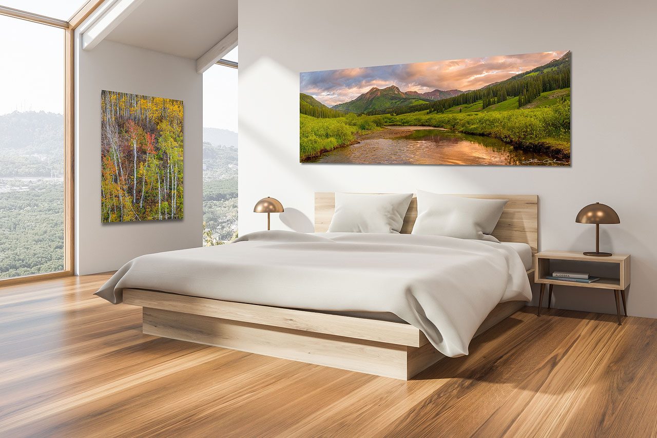 Interior design with nature photography showcases a large panoramic fine art print of a mountain valley, and another of fall color aspen trees. in a modern bedroom - Gintchin Fine Art