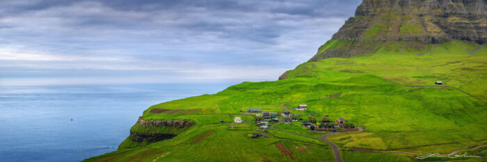 A remote tiny village on the edge of a steep coast right next to the ocean - Faroe Islands - Gintchin Fine Art