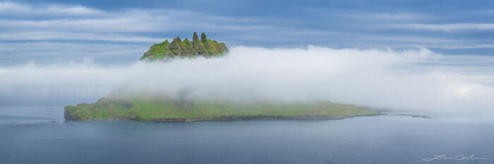 A beautiful mountain islan engulfed in ocean fog - Faroe Islands - Gintchin Fine Art