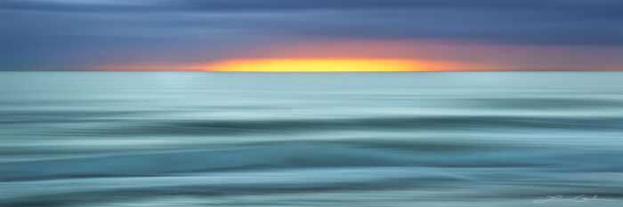 An abstract ocean sunrise with a 3D looking ocean - Gintchin Fine Art