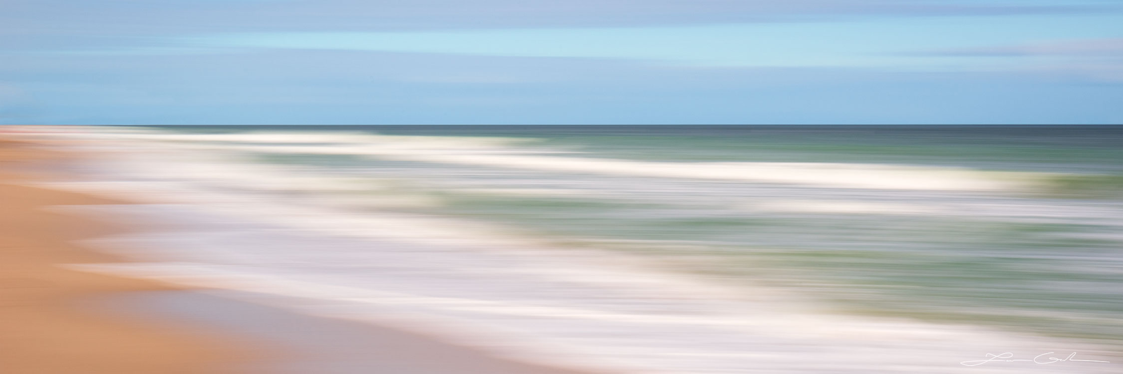 An ocean beach abstract panorama with white waves and blue skies - Gintchin Fine Art