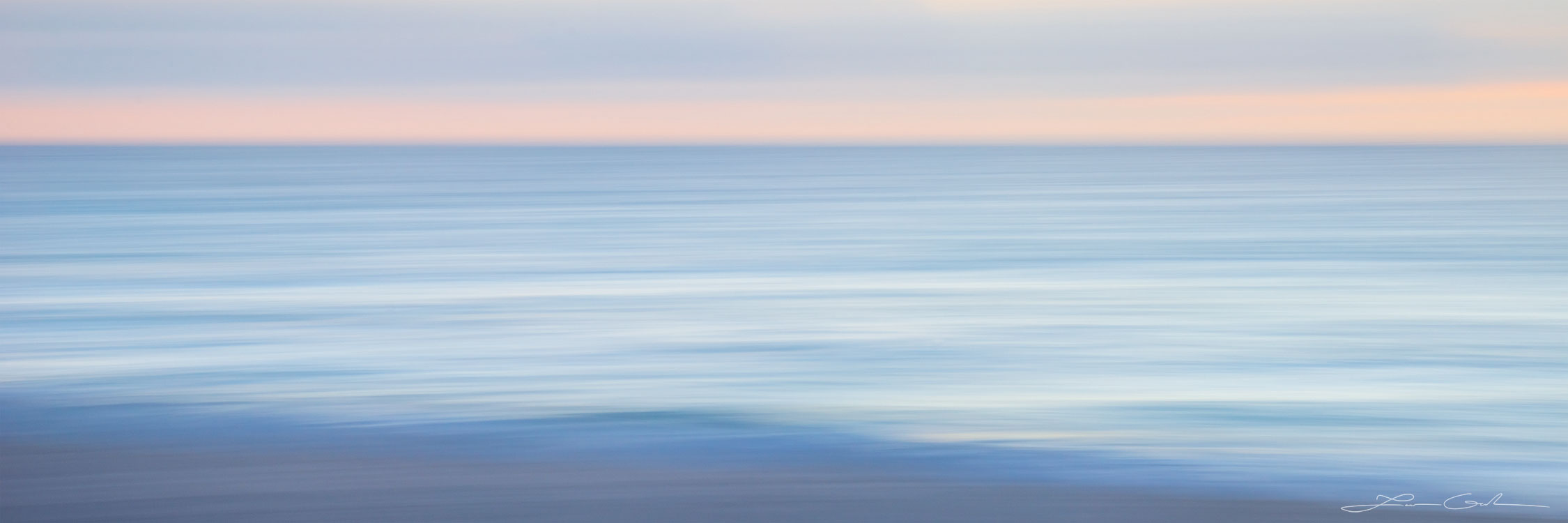 Abstract seascape panorama with blue ocean water and some pink clouds - Gintchin Fine Art