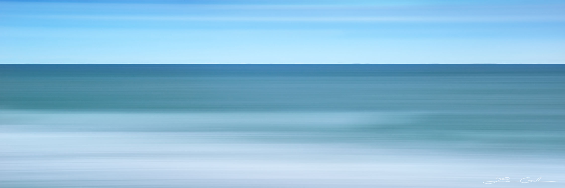 A soft blue ocean abstract panoramic photograph with blue water and sky - Gintchin Fine Art