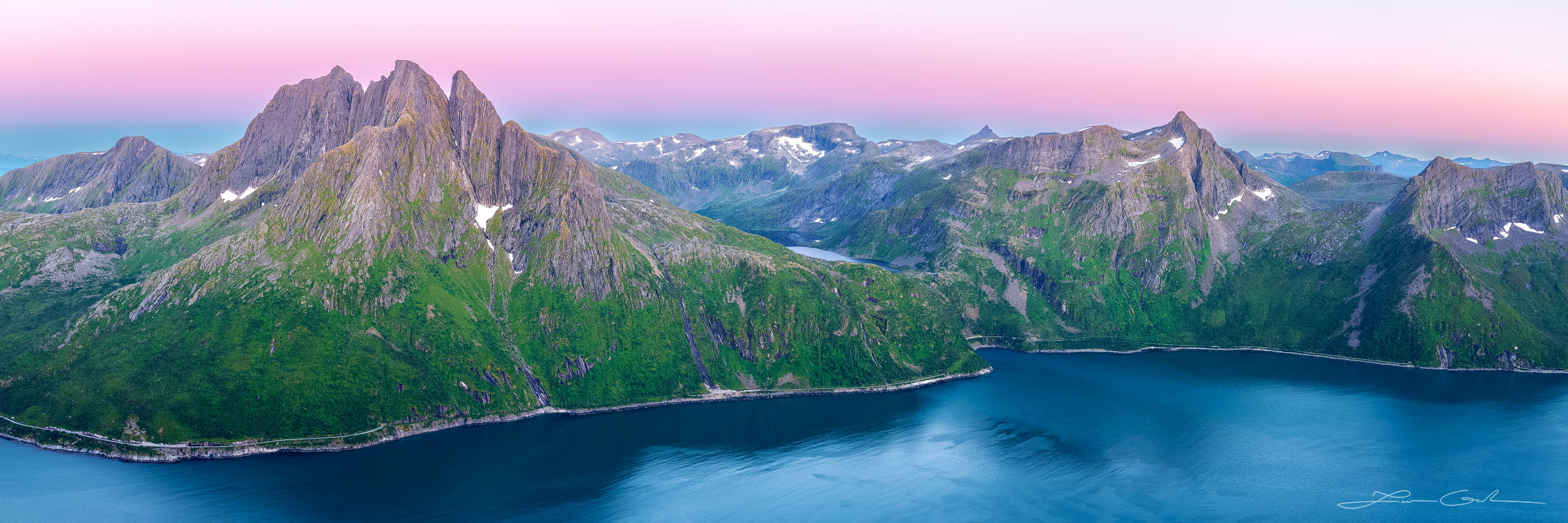 Stunning scandinavian mountains at twilight on a rugged fjord coast in Norway - Gintchin Fine Art