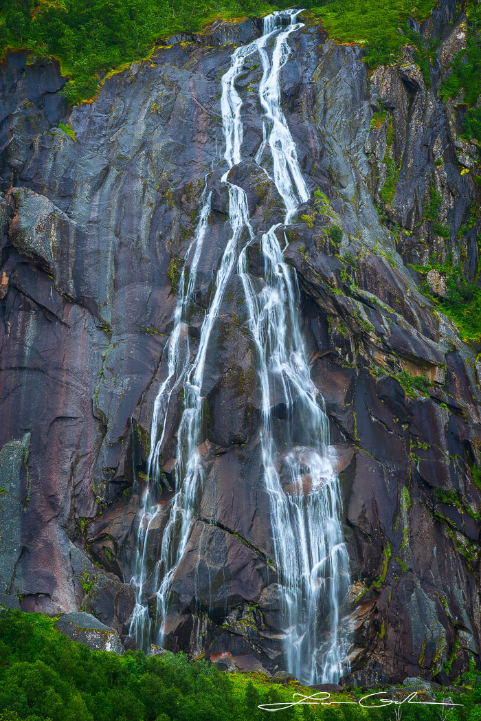 A huge and beautiful waterfall in Lofoten, Norway - Gintchin Fine Art