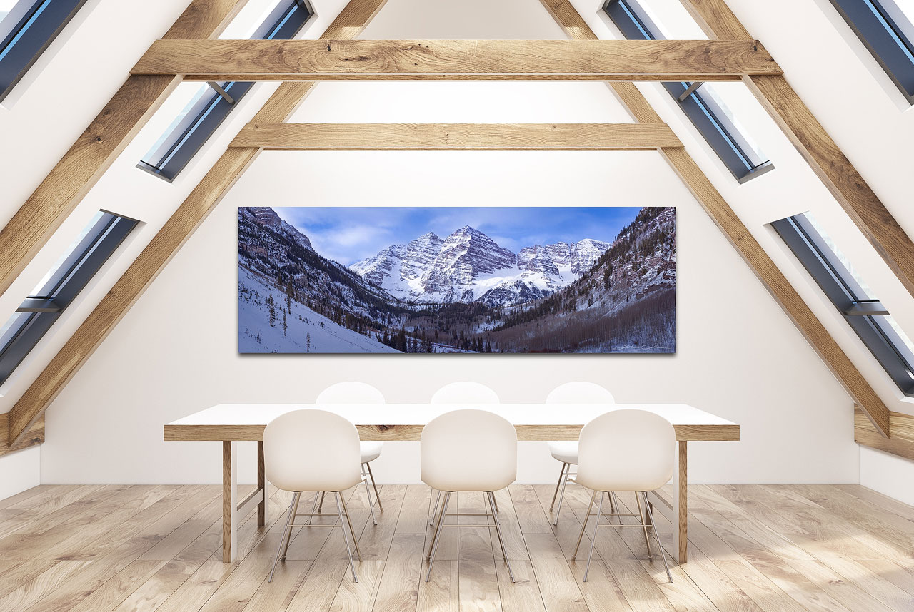 A winter panoramic print of a Maroon Bells, Colorado in a contemporary dining room - Gintchin Fine Art