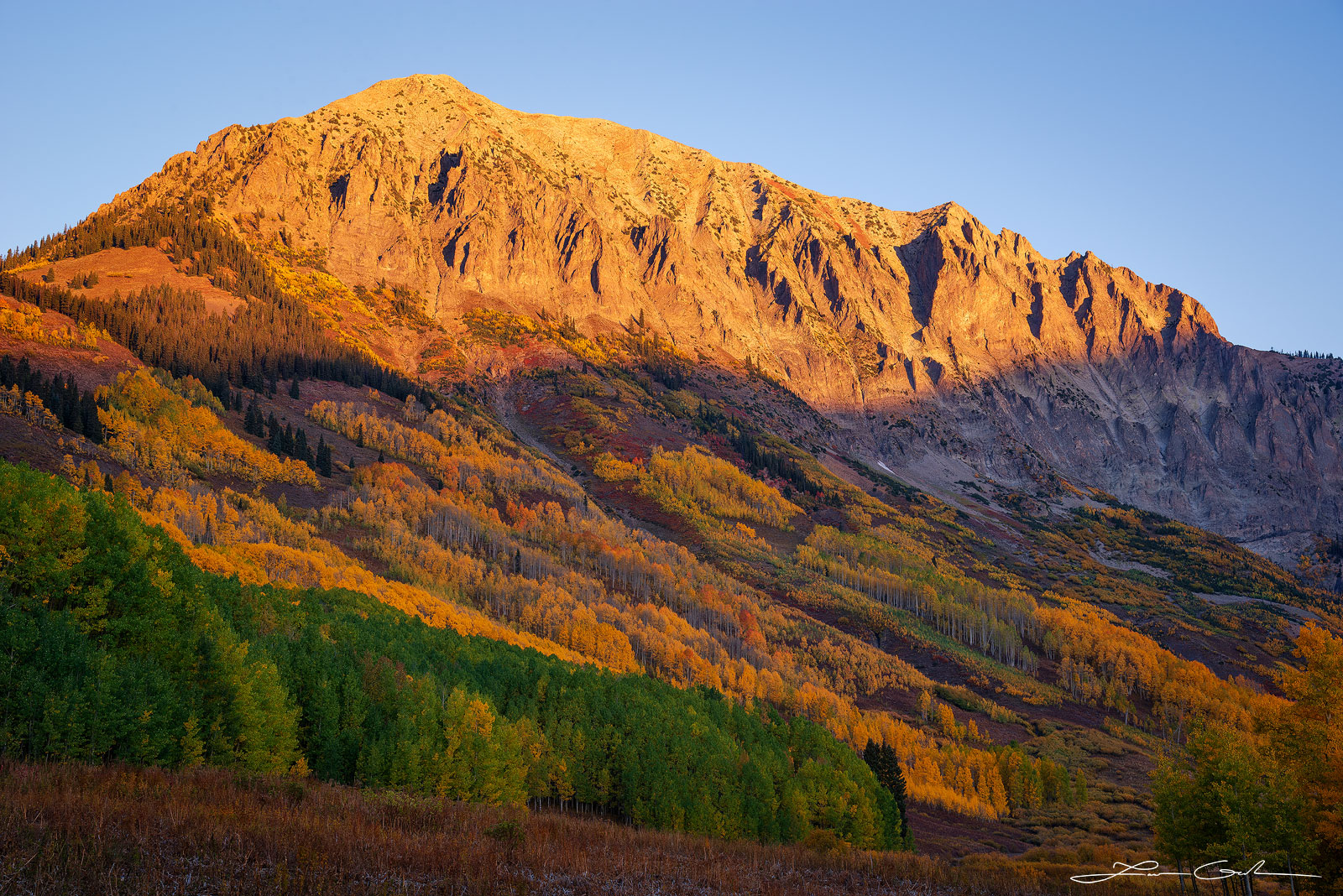 Gothic Mountain in Crested Butte, Colorado, displaying stunning Aspen Mountain landscape during fall with vibrant aspen trees, a masterpiece captured at sunrise. - Gintchin Fine Art