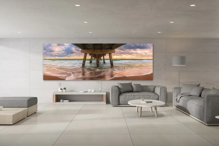 A wall art of a Florida pier in a contemporary living room - Gintchin Fine Art
