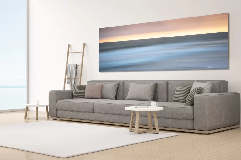 Ocean abstract wall art above a living room couch - Gintchin Fine Art