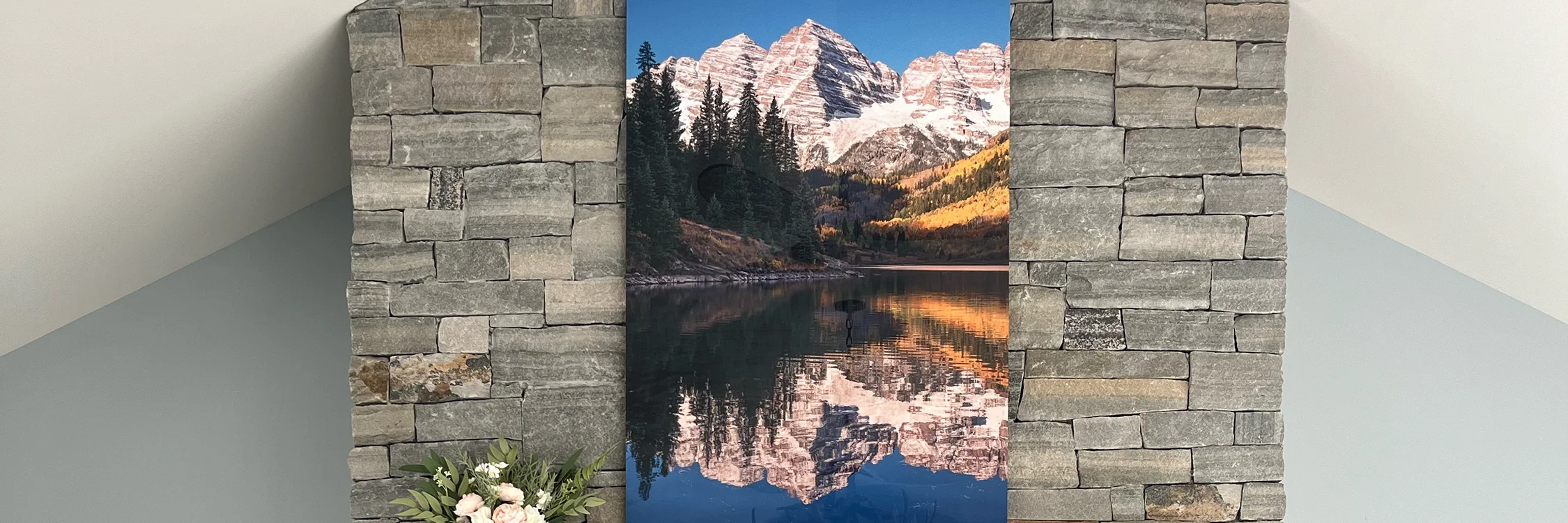 A high quality fine art print of Maroon Bells, Colorado hanging above a modern fireplace - Gintchin Fine Art