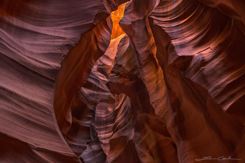 A natural cathedral of red sandstone inside Antelope Canyon, Arizona